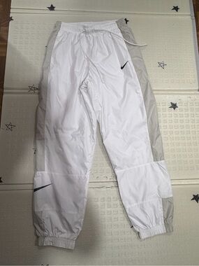 Nike White Mesh Athletic pants with Black Swoosh